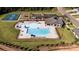 Aerial view of community pool, clubhouse, tennis court and playground at 535 Trading Post Ln, York, SC 29745