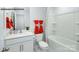 Clean bathroom with white fixtures, vanity, and orange accent towels at 535 Trading Post Ln, York, SC 29745
