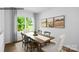 Elegant dining room with a wooden table, stylish chairs, and natural light at 535 Trading Post Ln, York, SC 29745