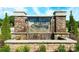 Elegant stone entrance sign for Fergus Crossing featuring a water feature and manicured landscaping at 535 Trading Post Ln, York, SC 29745