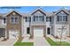 Charming townhome exterior with stone accents, attached garage, and well-maintained landscaping at 535 Trading Post Ln, York, SC 29745