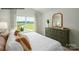 Bright bedroom features a large window and neutral decor at 535 Trading Post Ln, York, SC 29745