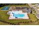 Aerial view of the community pool, playground, and clubhouse, offering a variety of recreational options at 535 Trading Post Ln, York, SC 29745