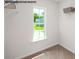 Walk-in closet with a window and built in shelving at 535 Trading Post Ln, York, SC 29745