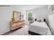 Cozy bedroom with neutral tones, a full size bed, wood dresser, and natural light at 537 Trading Post Ln, York, SC 29745