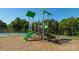 Community playground with various play structures and a wood chip ground cover at 537 Trading Post Ln, York, SC 29745