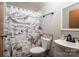 Charming bathroom featuring a toilet, sink, decorative shower curtain, and cowboy themed decor at 5448 Bill Sain Rd, Vale, NC 28168