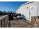 Inviting wood deck with outdoor grill and access to home entrance, perfect for entertaining and enjoying outdoor cooking at 5448 Bill Sain Rd, Vale, NC 28168