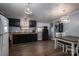 Bright kitchen and dining area with stylish lighting and ample seating space at 5448 Bill Sain Rd, Vale, NC 28168