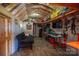 A flexible storage area, furnished for leisure, inside of a versatile outbuilding or storage shed at 5448 Bill Sain Rd, Vale, NC 28168