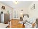 Bedroom with wood floors, large windows, and ample natural light at 601 Highland Forest Dr, Charlotte, NC 28270