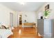 Bedroom featuring wood floors, natural light, and a calm setting at 601 Highland Forest Dr, Charlotte, NC 28270