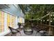 A cozy backyard deck area perfect for outdoor entertaining at 601 Highland Forest Dr, Charlotte, NC 28270