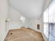 Bright bedroom featuring neutral carpeting, a window with horizontal blinds, and an ensuite bathroom at 6200 Summertree Ln, Charlotte, NC 28226
