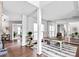 Bright home office featuring hardwood floors, white trim, large windows, and ample natural light at 6200 Summertree Ln, Charlotte, NC 28226
