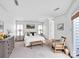 Spacious main bedroom with a neutral color palette, offering a bright and serene atmosphere at 6200 Summertree Ln, Charlotte, NC 28226