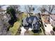 Stunning aerial view showcasing the house's architecture, landscaping, and proximity to the waterfront at 6403 Amos Smith Rd, Charlotte, NC 28214