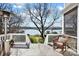 Backyard deck with lake view and comfortable seating, perfect for outdoor relaxation at 6403 Amos Smith Rd, Charlotte, NC 28214