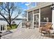 Charming backyard deck with cozy seating and a serene lake view, ideal for relaxation at 6403 Amos Smith Rd, Charlotte, NC 28214