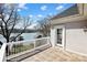 Relaxing balcony featuring water view, white railing, and door to interior of house at 6403 Amos Smith Rd, Charlotte, NC 28214