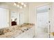 Well-lit bathroom with granite countertops and view of toilet and bedroom at 6403 Amos Smith Rd, Charlotte, NC 28214