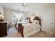 Bright bedroom with twin beds, window and floral bedding creating a welcoming space at 6403 Amos Smith Rd, Charlotte, NC 28214