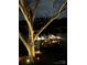 Illuminated dock at night offering secure boat storage and a peaceful waterfront ambiance enhancing nighttime enjoyment at 6403 Amos Smith Rd, Charlotte, NC 28214