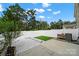 This backyard features artifical turf and modern landscaping at 769 River Park Rd, Belmont, NC 28012