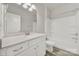 This bathroom is well lit and features double sinks, and a tub with shower at 769 River Park Rd, Belmont, NC 28012