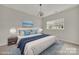 Virtually staged bedroom with neutral walls, carpet, and a window bringing in natural light at 769 River Park Rd, Belmont, NC 28012