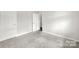 Neutral bedroom featuring two doors, plush carpeting, and ample space for personalization and comfort at 769 River Park Rd, Belmont, NC 28012