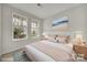 Well-lit bedroom with stylish decor, comfortable bed, and inviting ambiance, perfect for relaxation at 769 River Park Rd, Belmont, NC 28012