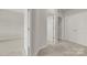 Upstairs hallway featuring carpet flooring, neutral walls and doorways at 769 River Park Rd, Belmont, NC 28012