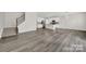 Spacious open living area with kitchen and staircase with natural light at 769 River Park Rd, Belmont, NC 28012