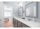 Bathroom showcasing a double vanity, ample counter space, and neutral color palette at 8504 Soaring Eagle Ln, Waxhaw, NC 28173