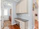 Charming home office space with built-in desk, drawers, and ample storage cabinets at 8504 Soaring Eagle Ln, Waxhaw, NC 28173