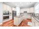 Spacious kitchen with granite countertops, stainless steel appliances, and ample cabinet space at 8504 Soaring Eagle Ln, Waxhaw, NC 28173