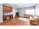 Living room features hardwood floors, built-in cabinets, and a comfortable sofa at 8504 Soaring Eagle Ln, Waxhaw, NC 28173