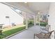 Back patio with seating overlooks a grassy yard area at 8504 Soaring Eagle Ln, Waxhaw, NC 28173