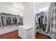 Well-organized walk-in closet with ample hanging space and built-in drawers at 8504 Soaring Eagle Ln, Waxhaw, NC 28173