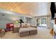Finished basement featuring a cozy sofa and walkout to the patio at 910 Forest Dr # 14, Lancaster, SC 29720