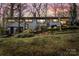 Exterior of the home with a large yard and landscaping at dusk at 910 Forest Dr # 14, Lancaster, SC 29720