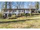 Exterior of the home with a large yard and landscaping at 910 Forest Dr # 14, Lancaster, SC 29720