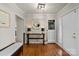 Inviting foyer features hardwood floors, decorative lighting, and a coat closet at 910 Forest Dr # 14, Lancaster, SC 29720