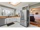 Modern kitchen featuring stainless steel appliances, butcher block countertops, and white marble tile floors at 910 Forest Dr # 14, Lancaster, SC 29720