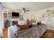Comfortable living room features built-in shelving, large windows, and hardwood floors at 910 Forest Dr # 14, Lancaster, SC 29720
