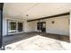 Covered outdoor patio featuring concrete floors and access to the backyard through sliding glass doors at 910 Forest Dr # 14, Lancaster, SC 29720