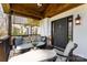 Relaxing covered porch offers seating, a swing, and front door access at 910 Forest Dr # 14, Lancaster, SC 29720