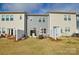 Backyard view with a patio set and fenced-in yard at 1028 Grays Mill Rd, Charlotte, NC 28215