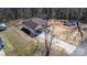 A long driveway leads to a house in this aerial view, featuring a wooded surrounding at 105 4Th Se St, Catawba, NC 28609